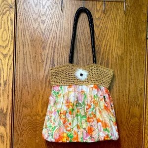 Floral Tote with Straw accents w/ bronze rose embellishment on a tuft of fur
